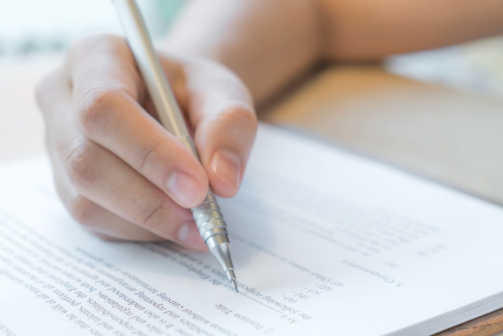 hand-with-pen-application-form 1