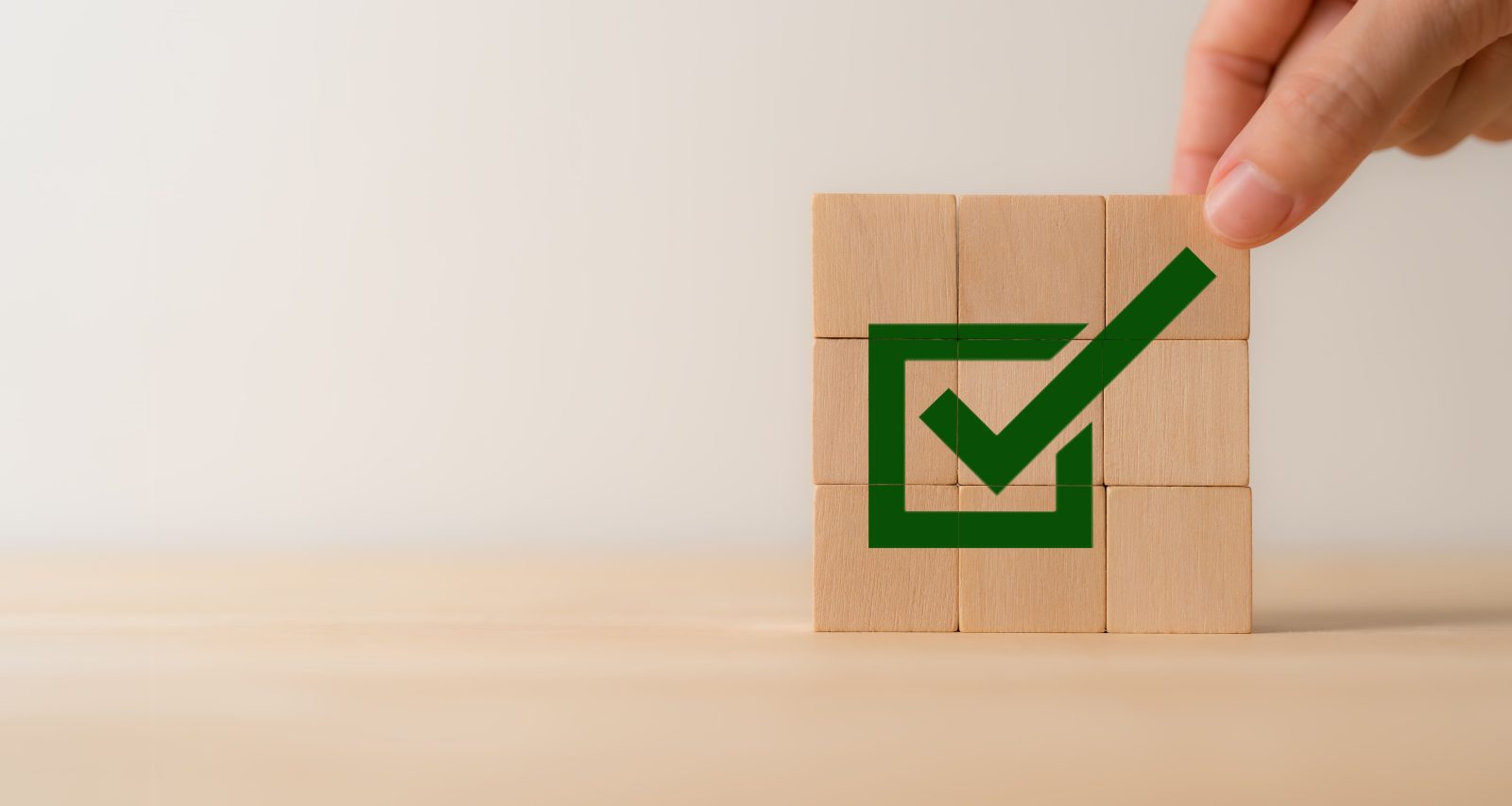 stacking-wooden-block-with-green-checkmark-icon-corporate-regulatory-compliance-goals-achievement-business-success-task-completion-ethical-corporate-right-thing-quality-symbol