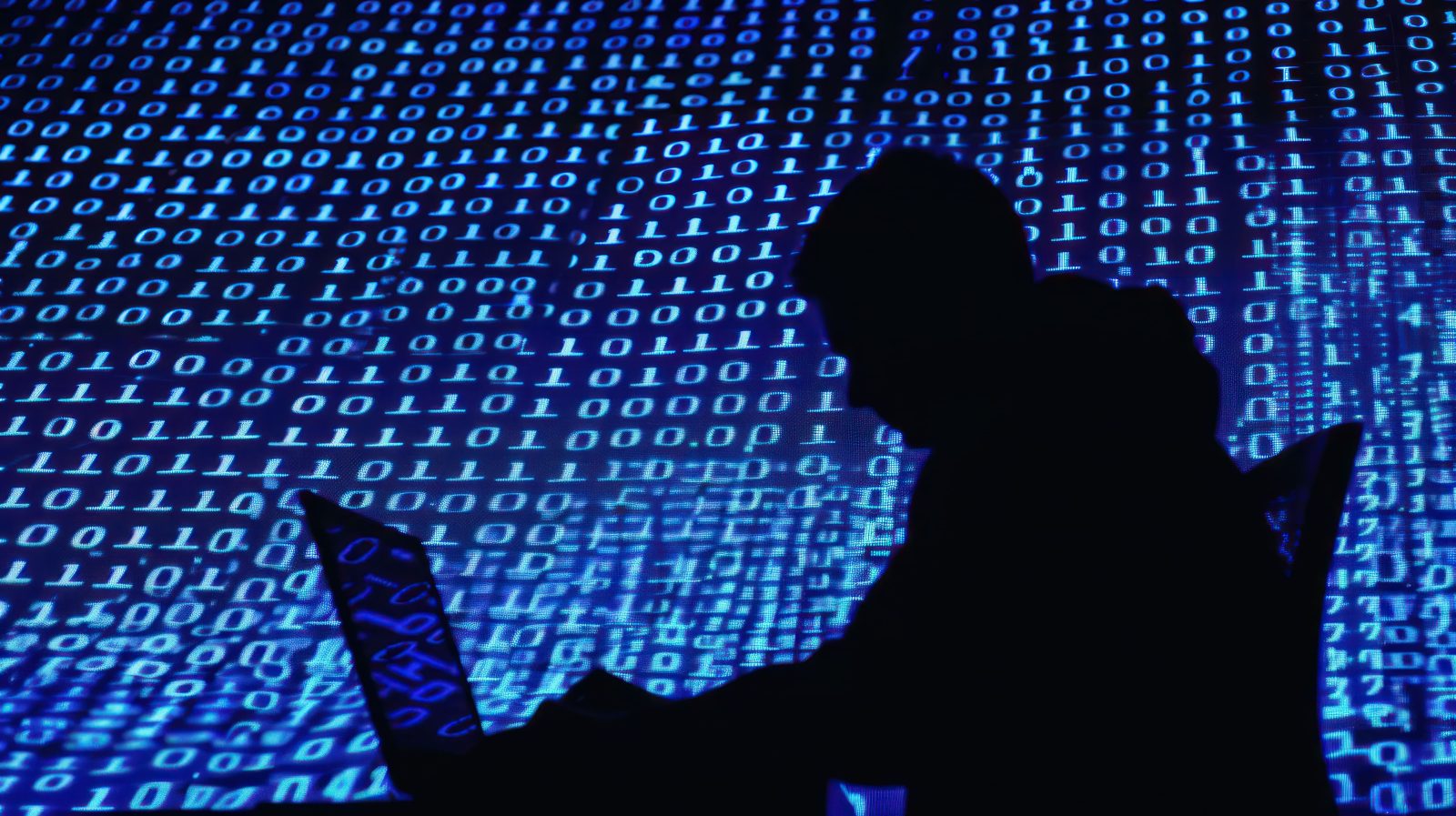 hacker-silhouette-digital-world