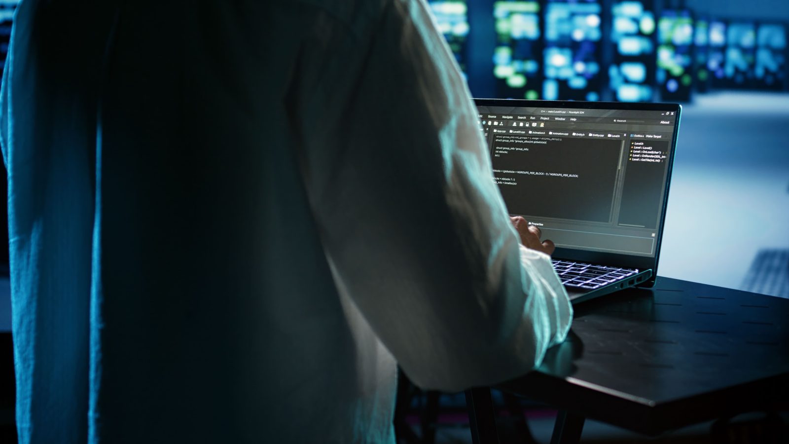 licensed-programmer-running-code-laptop-troubleshooting-updating-data-center-equipment-designed-accommodate-server-clusters-networking-systems-storage-arrays-close-up