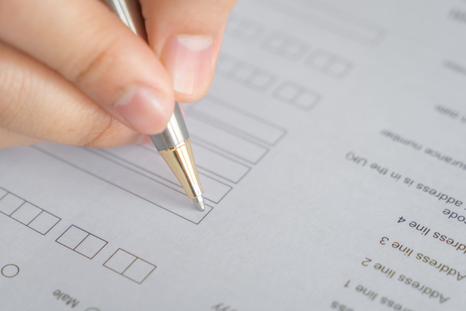 hand-with-pen-application-form 3