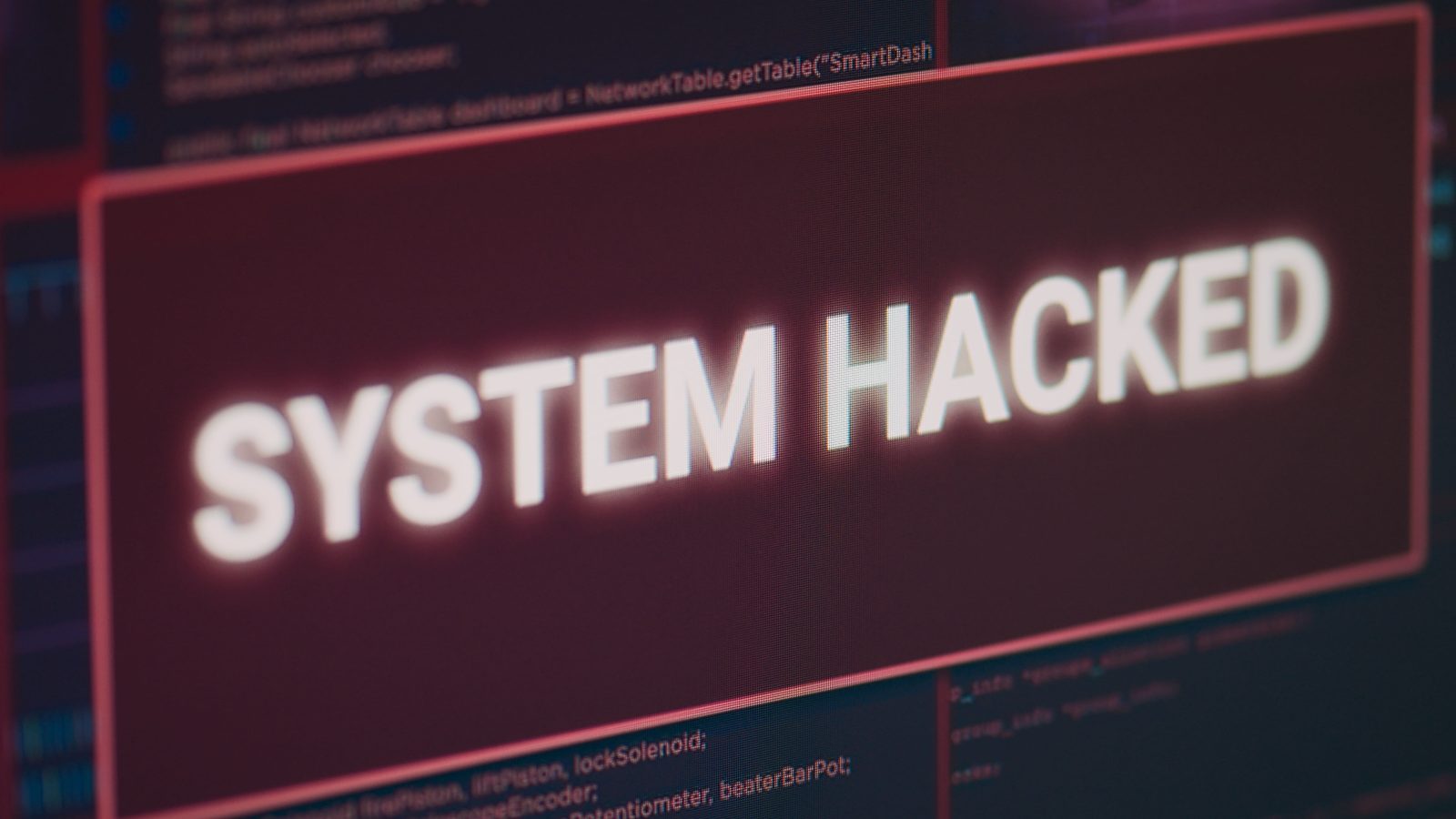 hacked-system-alert-message-flashing-computer-screen-showing-security-breach-error-cyber-crime-attack-monitor-displaying-system-error-security-computer-malfunction-close-up