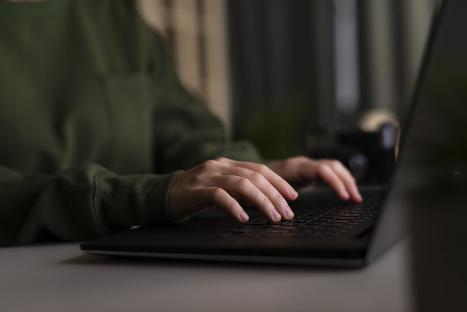front-view-woman-working-laptop 1