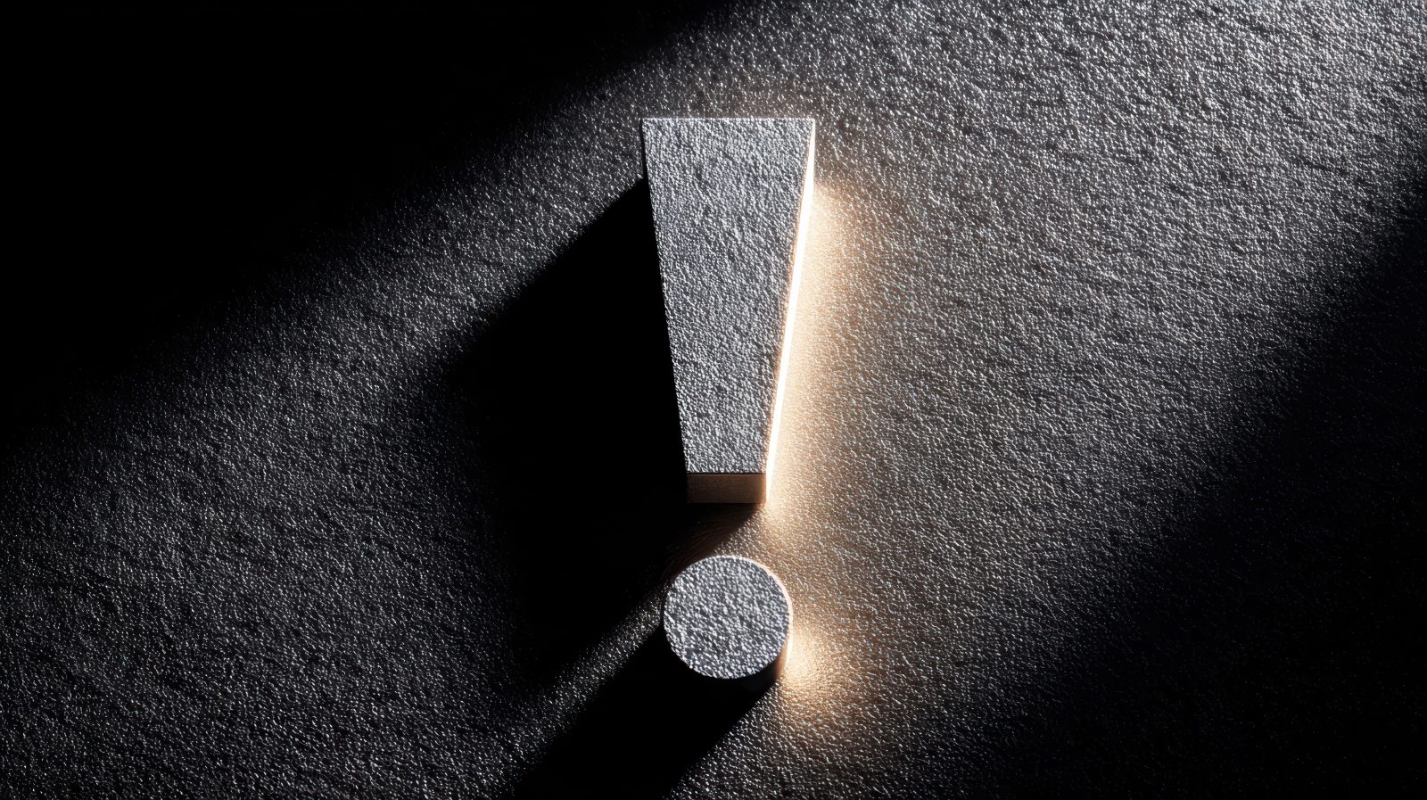 closeup-coin-dropping-into-dark-crack-with-dramatic-spotlight-effect 1