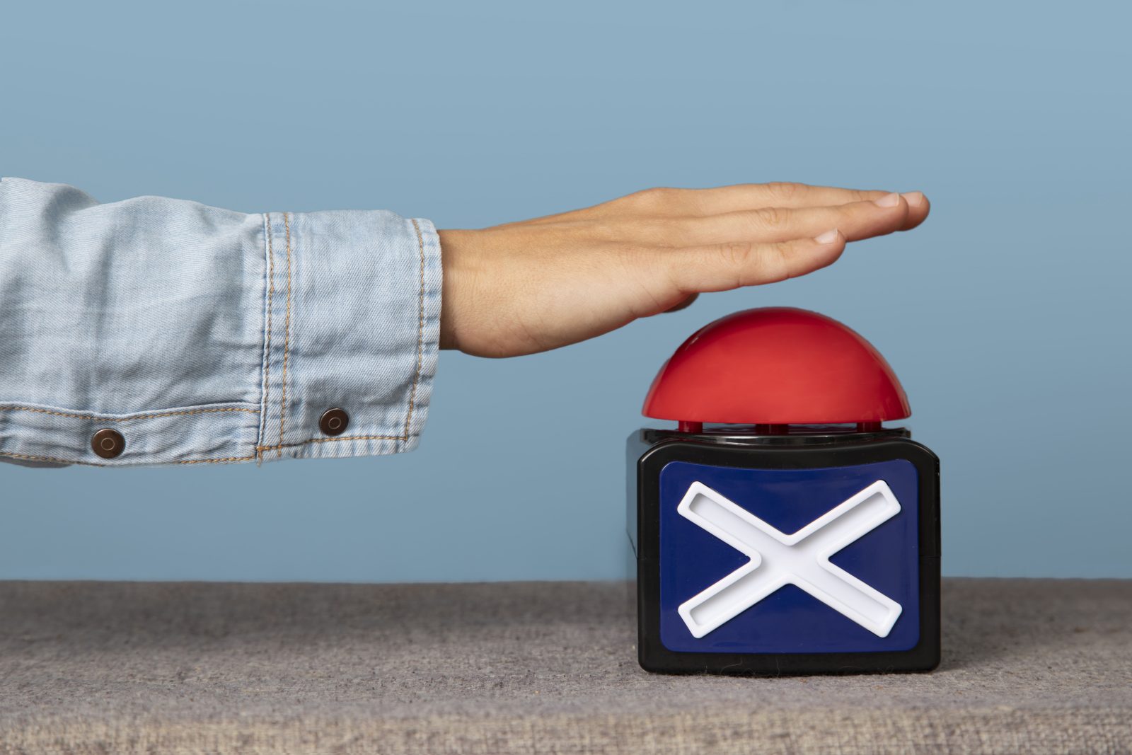 young-adult-pressing-buzzer-button